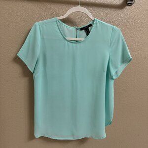 teal blouse